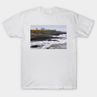 Waves battering the coast near Dustanburgh castle Northumberland, UK T-Shirt